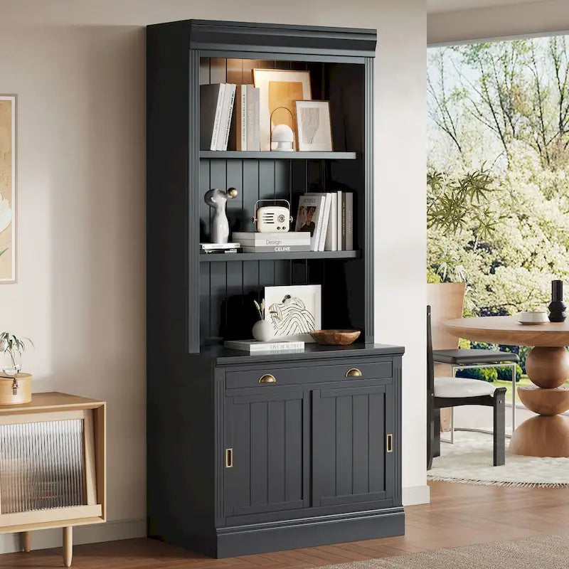 Tall Bookcase with LED Top Lighting 3 Open Shelves Center Drawer 2 Sliding Doors Beadboard Panels and Gold Semicircle Pulls